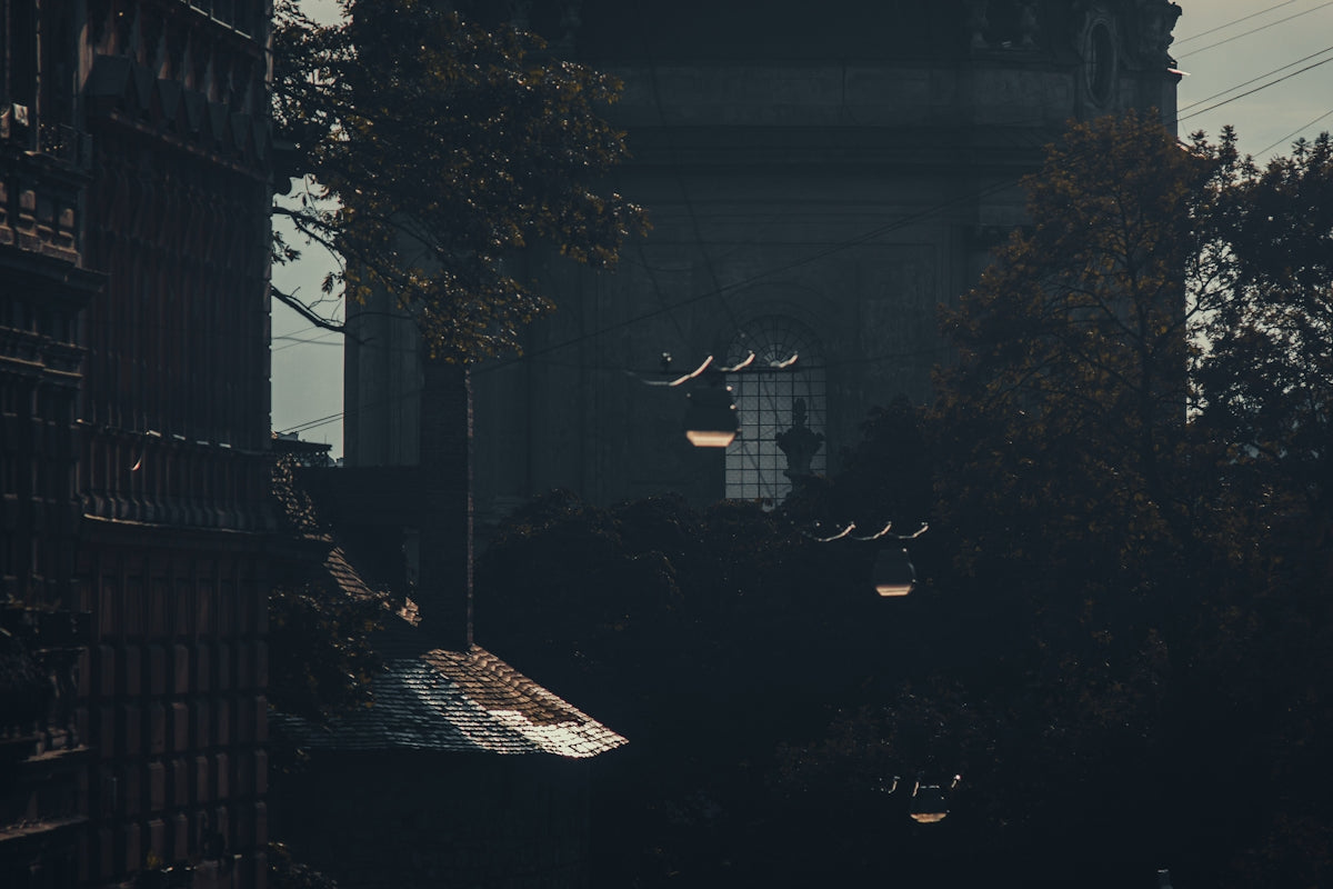 a building with a clock tower in the background