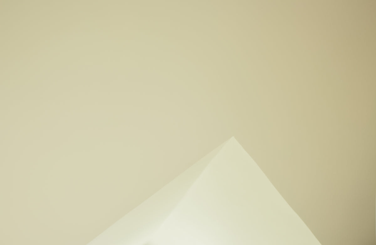 a white triangular object