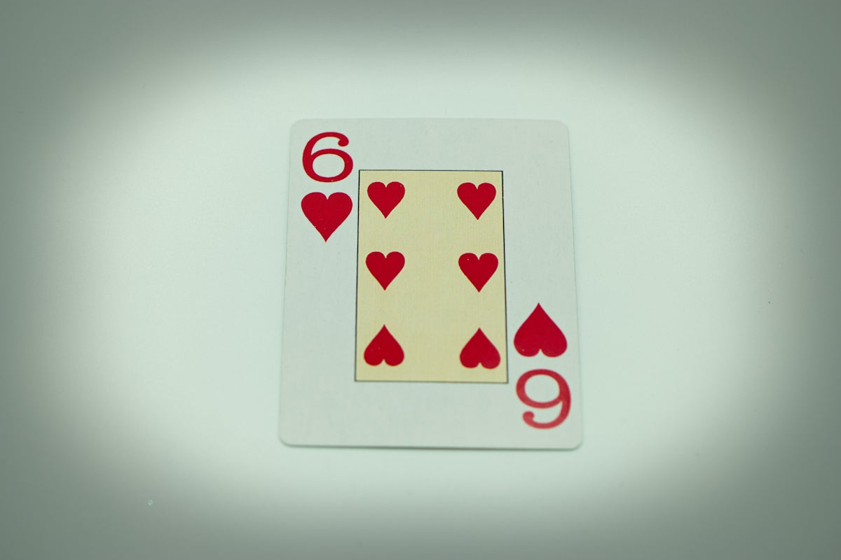a four of a kind of playing card with hearts on it