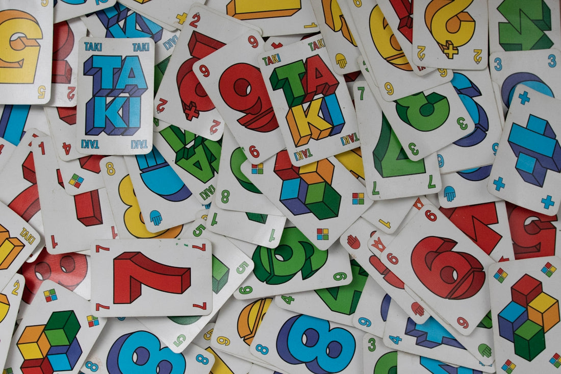 a pile of stickers with numbers and letters on them