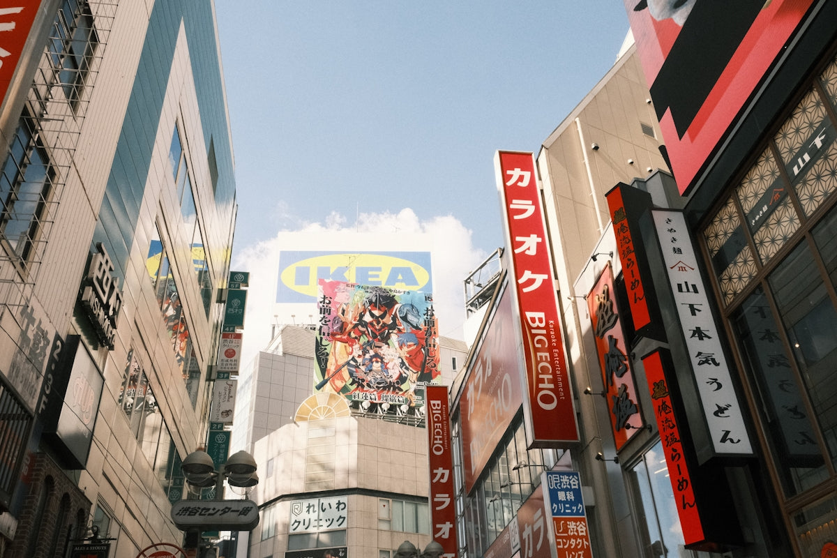 a city street filled with lots of tall buildings