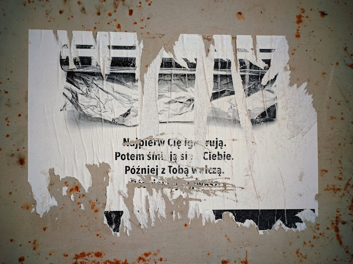 A picture of a sign on the side of a building