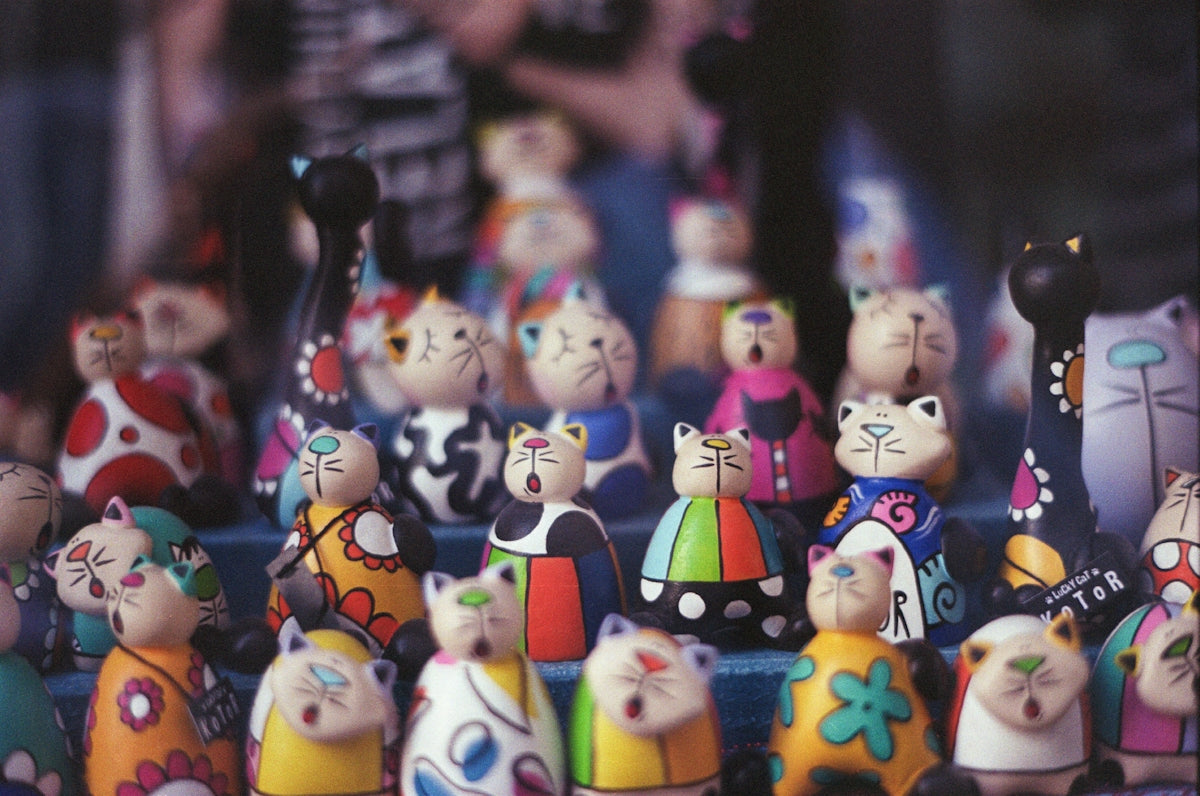 A bunch of small toy figurines sitting on top of a table