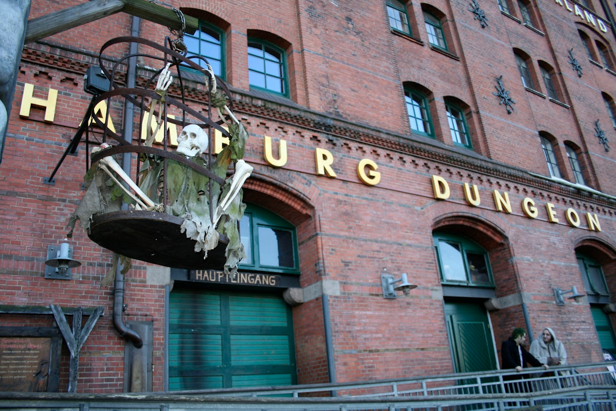 A large brick building with a sign on the front of it