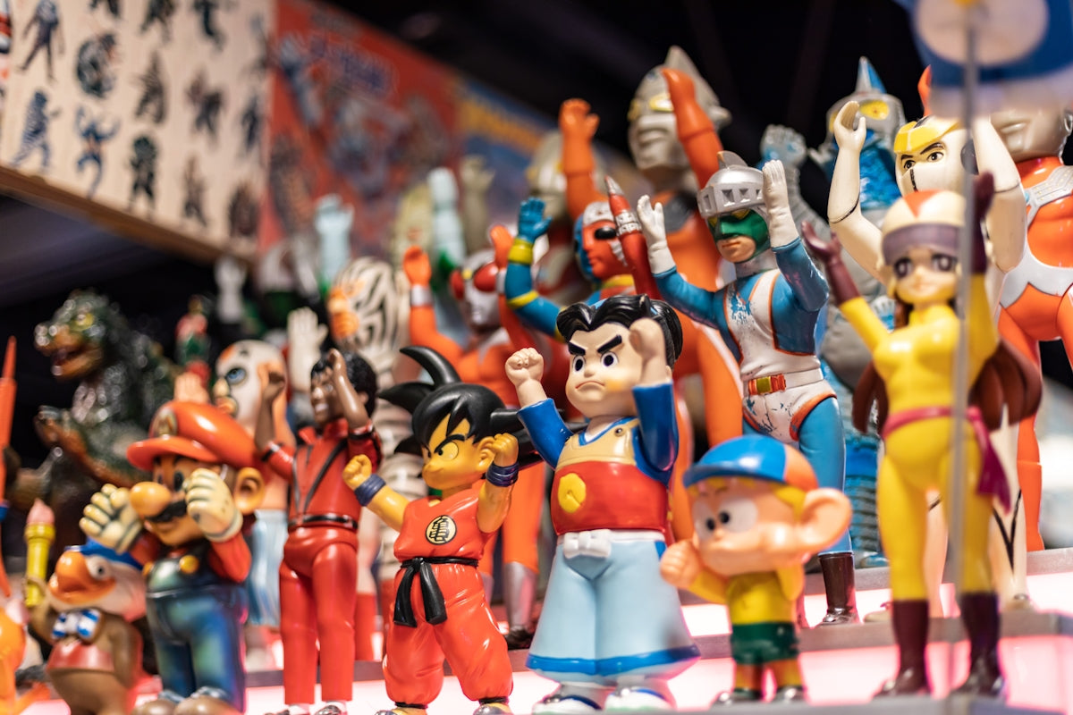 A collection of vintage superhero toys.