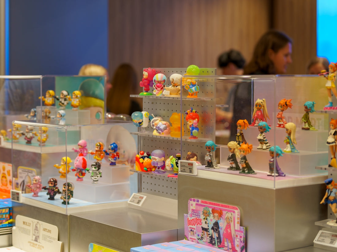 Display of colorful collectible toys on shelves.